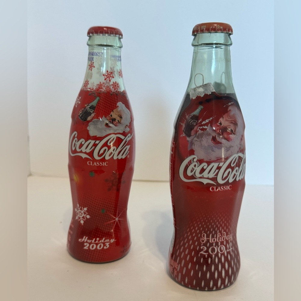 Coca Cola 2003 & 2004 holiday unopened bottles